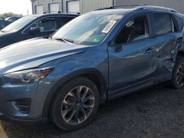  Salvage Mazda Cx